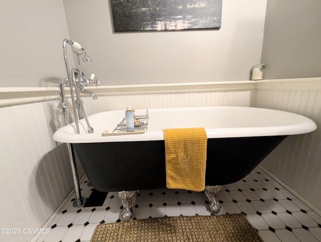 2852 State Route 487, Orangeville, PA 17859 - full bath featuring a wainscoted wall and a soaking tub