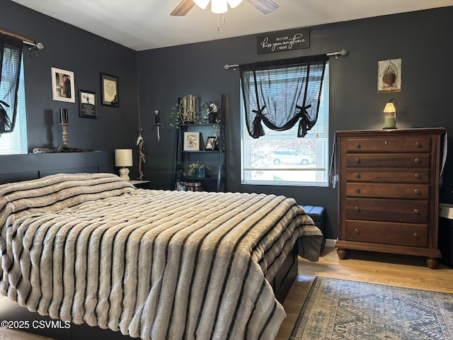 220 Spring Lake Crst, Watsontown, PA 17777 - bedroom with wood finished floors and ceiling fan
