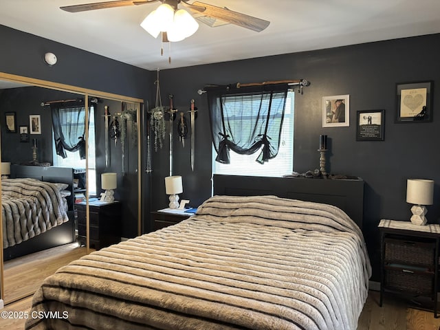 220 Spring Lake Crst, Watsontown, PA 17777 - bedroom with wood finished floors, a closet, and ceiling fan