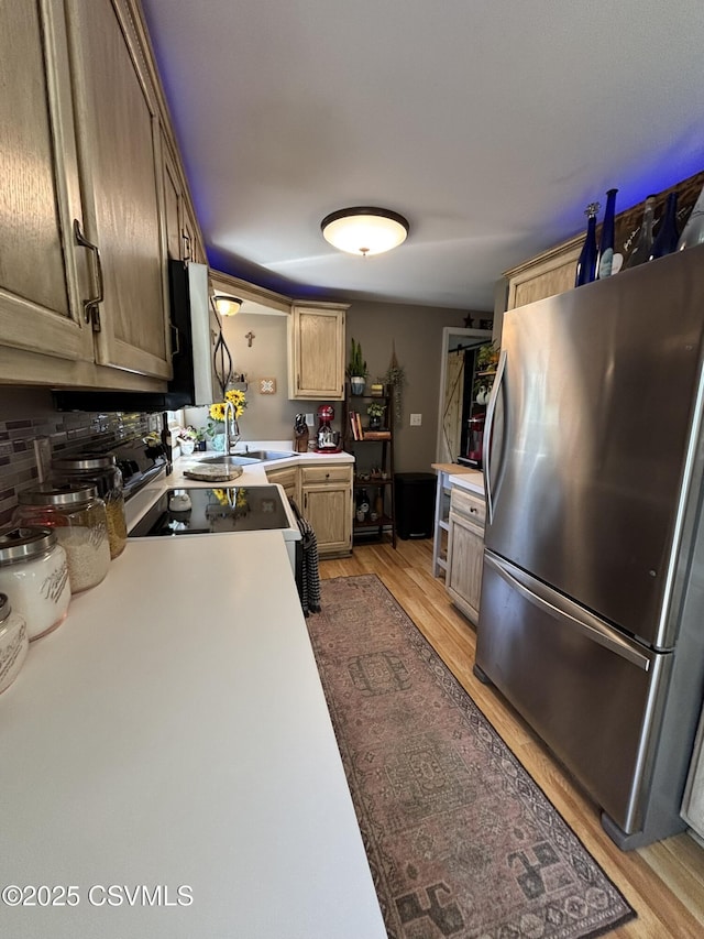 220 Spring Lake Crst, Watsontown, PA 17777 - kitchen featuring freestanding refrigerator, a sink, light wood finished floors, and light countertops