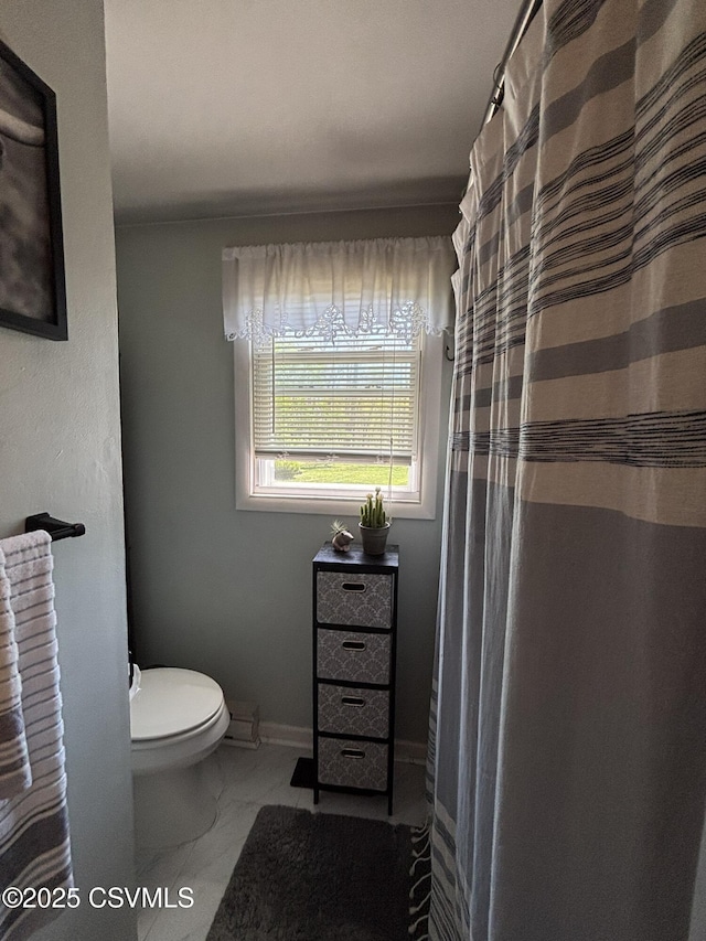 220 Spring Lake Crst, Watsontown, PA 17777 - bathroom with marble look tile flooring and toilet