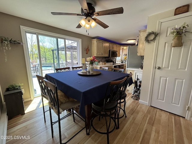 220 Spring Lake Crst, Watsontown, PA 17777 - dining room with light wood-style flooring and ceiling fan