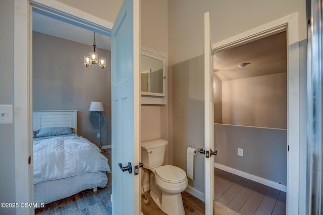 475 W 1st St, Bloomsburg, PA 17815 - ensuite bathroom with french doors, wood finished floors, and toilet