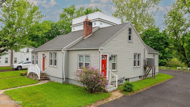 475 W 1st St, Bloomsburg, PA 17815 - view of front of home with a chimney, roof with shingles, a front lawn, and entry steps