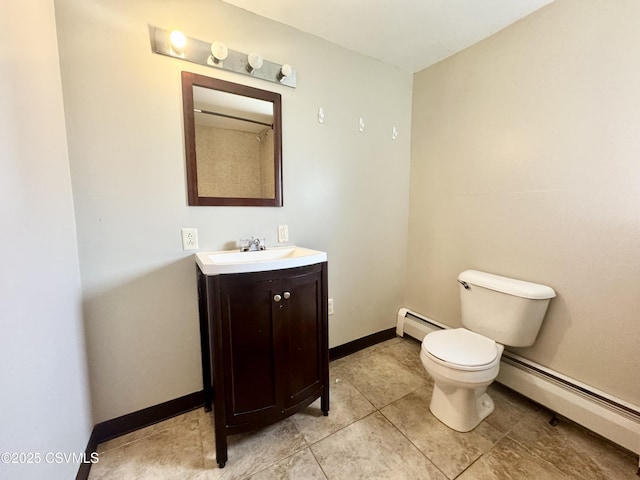 338 W Saylor St, Atlas, PA 17851 - bathroom featuring a baseboard heating unit, toilet, vanity, and baseboards