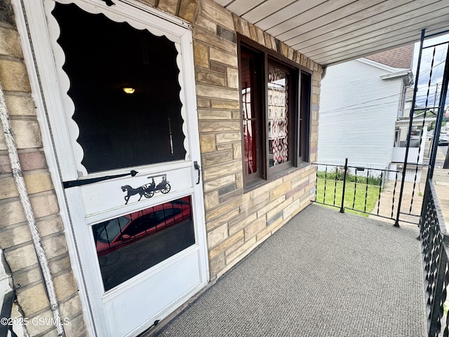 338 W Saylor St, Atlas, PA 17851 - doorway to property featuring stone siding and a porch