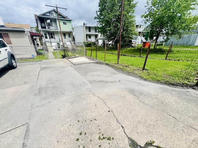 338 W Saylor St, Atlas, PA 17851 - view of concrete driveway with a gate and a residential view
