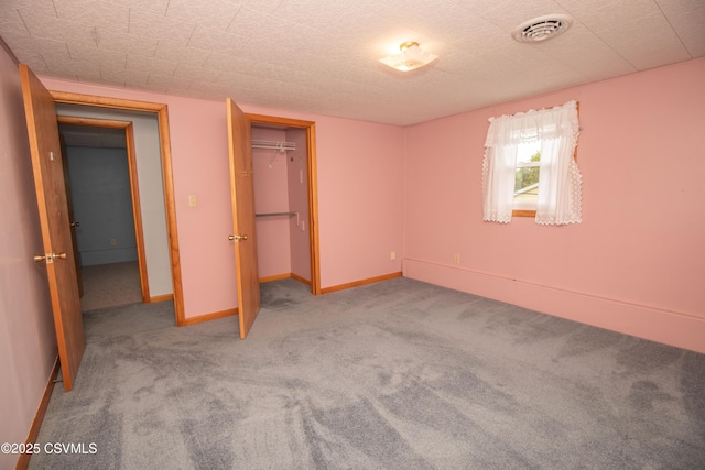 2256 Crossroads Dr, Lewisburg, PA 17837 - unfurnished bedroom with light carpet, baseboards, and a closet