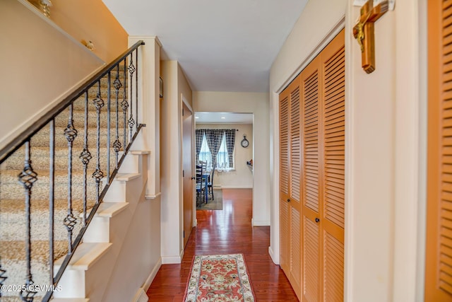 1207 E 5th St, Berwick, PA 18603 - hall with stairs, dark wood-type flooring, and baseboards