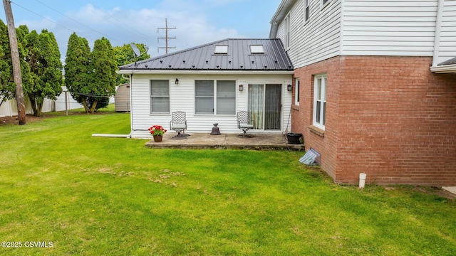 1207 E 5th St, Berwick, PA 18603 - rear view of property with a patio area, a yard, and metal roof