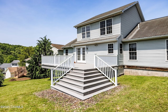 620 Sunset Dr, Bloomsburg, PA 17815 - rear view of house with stairs, a deck, a yard, and french doors