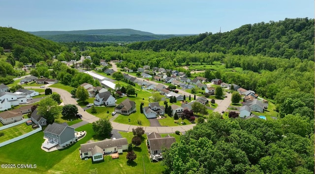 620 Sunset Dr, Bloomsburg, PA 17815 - aerial view of residential area featuring a heavily wooded area