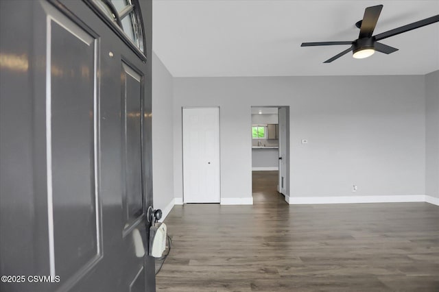 521 Church St, Danville, PA 17821 - empty room with a ceiling fan, dark wood-type flooring, baseboards, and a sink