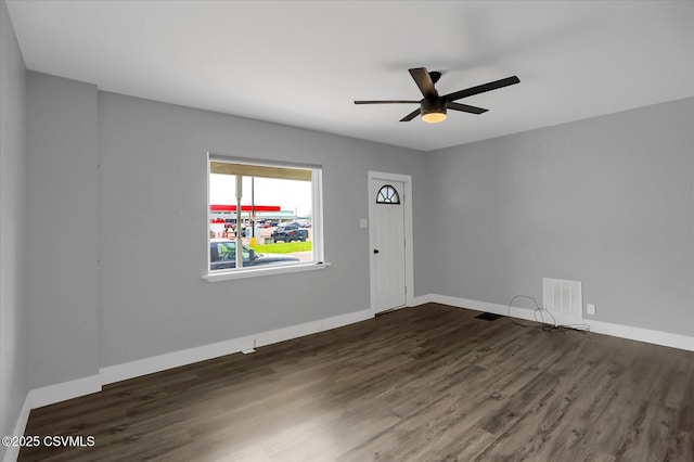 521 Church St, Danville, PA 17821 - unfurnished room featuring dark wood-type flooring, a ceiling fan, and baseboards
