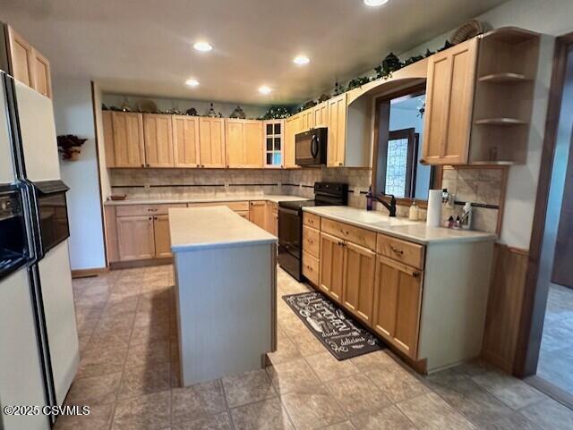 24 Boulder Ln, Berwick, PA 18603 - kitchen featuring black appliances, recessed lighting, a center island, light countertops, and backsplash