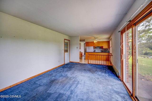 162 Liberty Valley Rd, Danville, PA 17821 - unfurnished living room featuring baseboards, carpet, and a ceiling fan