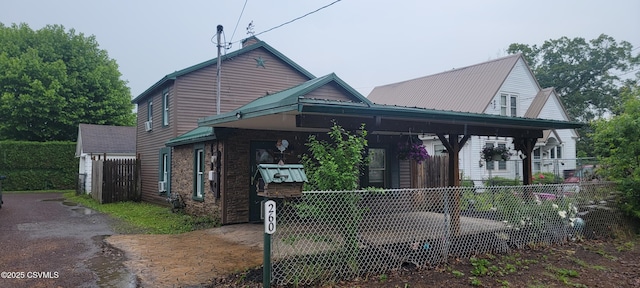 260 Iron St, Berwick, PA 18603 - view of front facade featuring metal roof
