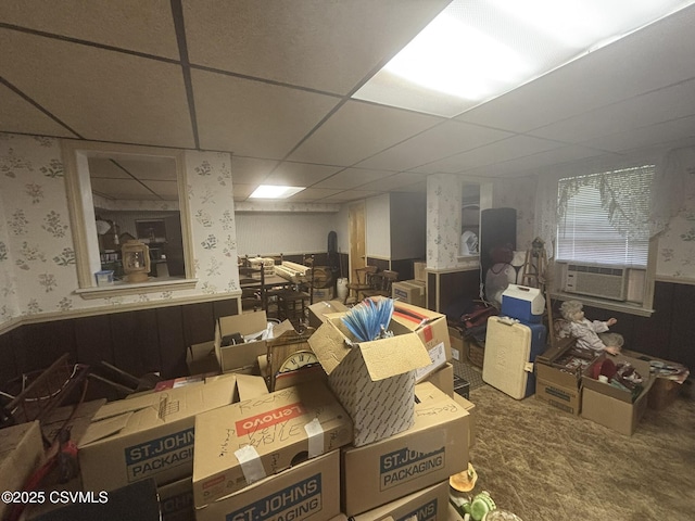 321 E Shamokin St, Trevorton, PA 17881 - below grade area featuring wallpapered walls, a wainscoted wall, a paneled ceiling, carpet floors, and cooling unit