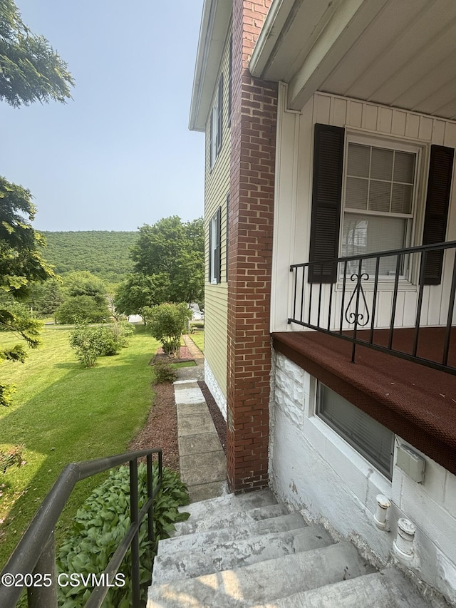 321 E Shamokin St, Trevorton, PA 17881 - view of property exterior featuring a lawn and brick siding