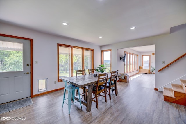 67 Center School Rd, Elysburg, PA 17824 - dining space with wood finished floors, stairs, baseboards, and recessed lighting