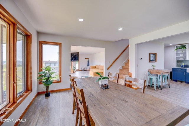 67 Center School Rd, Elysburg, PA 17824 - dining area featuring light wood-style floors, stairs, recessed lighting, and baseboards
