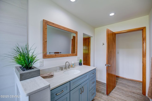 67 Center School Rd, Elysburg, PA 17824 - bathroom with vanity, wood finished floors, and recessed lighting