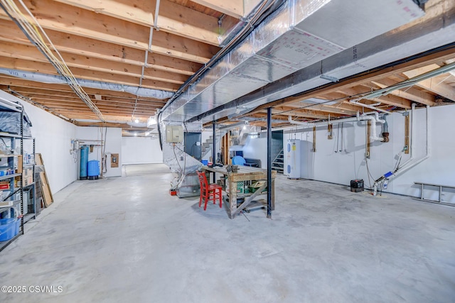 67 Center School Rd, Elysburg, PA 17824 - unfinished basement featuring water heater, stairway, and electric panel