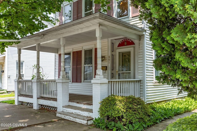 651 E Market St, Danville, PA 17821 - doorway to property featuring covered porch