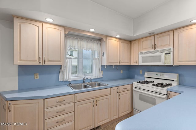 651 E Market St, Danville, PA 17821 - kitchen featuring white appliances, light brown cabinets, a sink, light countertops, and recessed lighting