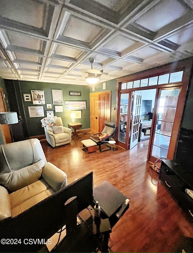 406 W Spruce St, Shamokin, PA 17872 - living room with wood finished floors, coffered ceiling, baseboards, and french doors
