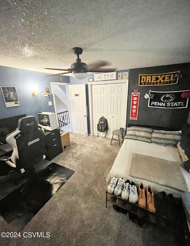406 W Spruce St, Shamokin, PA 17872 - bedroom featuring carpet, a textured ceiling, a closet, and a ceiling fan