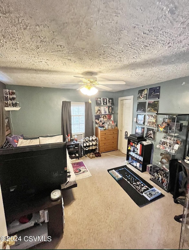 406 W Spruce St, Shamokin, PA 17872 - bedroom featuring carpet, a textured ceiling, and ceiling fan