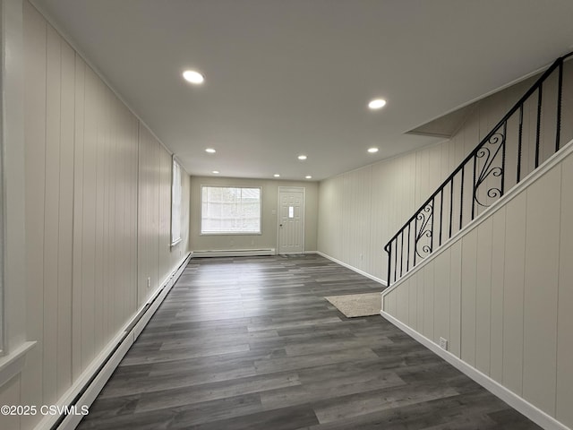 423 E Dewart St, Shamokin, PA 17872 - foyer entrance with stairs, dark wood finished floors, a baseboard heating unit, recessed lighting, and baseboards