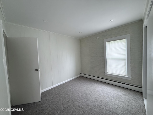 423 E Dewart St, Shamokin, PA 17872 - spare room with a baseboard radiator, carpet flooring, and crown molding