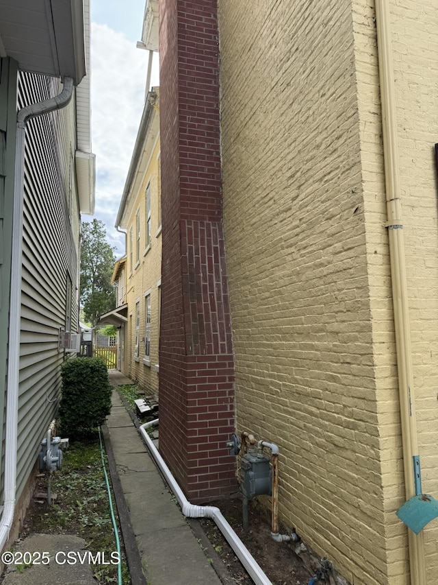 127 N 3rd St, Lewisburg, PA 17837 - view of side of home featuring brick siding