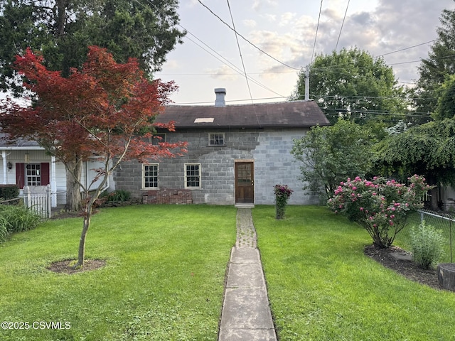 127 N 3rd St, Lewisburg, PA 17837 - rear view of house featuring concrete block siding