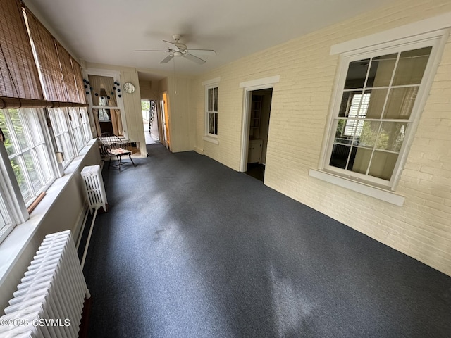 127 N 3rd St, Lewisburg, PA 17837 - unfurnished sunroom with radiator heating unit