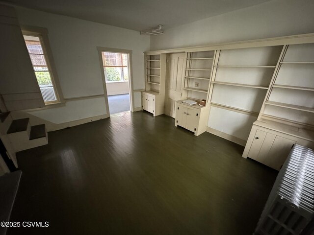 127 N 3rd St, Lewisburg, PA 17837 - unfurnished bedroom with dark wood finished floors and baseboards