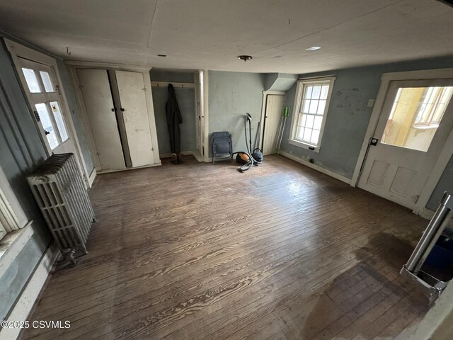 127 N 3rd St, Lewisburg, PA 17837 - foyer entrance with wood-type flooring and radiator
