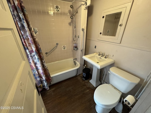 127 N 3rd St, Lewisburg, PA 17837 - bathroom featuring shower / tub combo, wood finished floors, and toilet