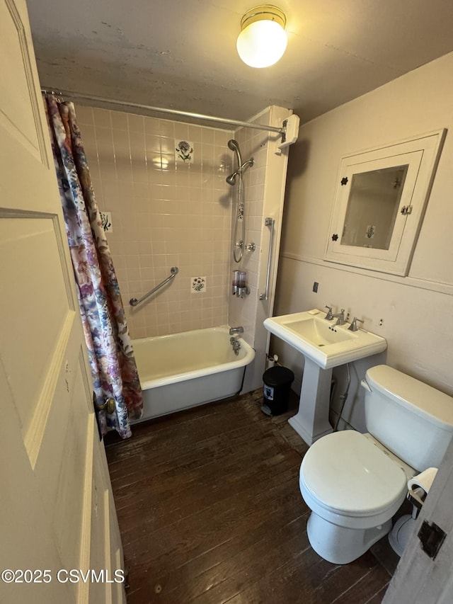 127 N 3rd St, Lewisburg, PA 17837 - full bathroom with toilet, shower / bath combination with curtain, and hardwood / wood-style floors