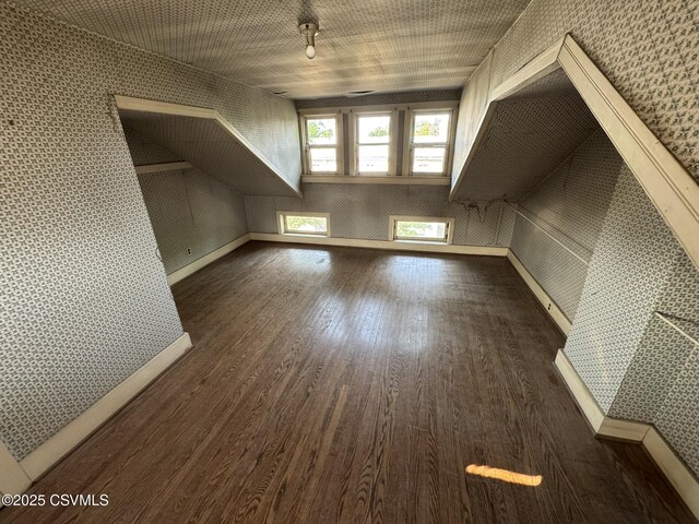 127 N 3rd St, Lewisburg, PA 17837 - bonus room featuring wallpapered walls, dark wood finished floors, and baseboards