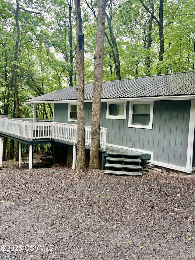 511 Snowflake Ln, Shickshinny, PA 18655 - view of front of property with a deck, metal roof, and view of scattered trees