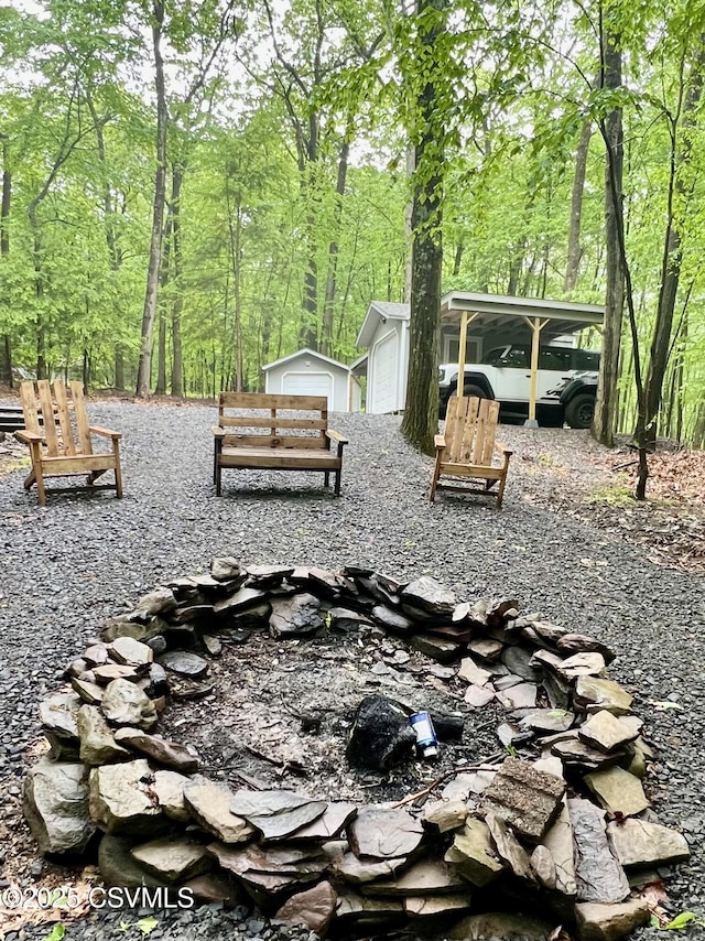 511 Snowflake Ln, Shickshinny, PA 18655 - view of yard featuring an outdoor structure and a wooded view