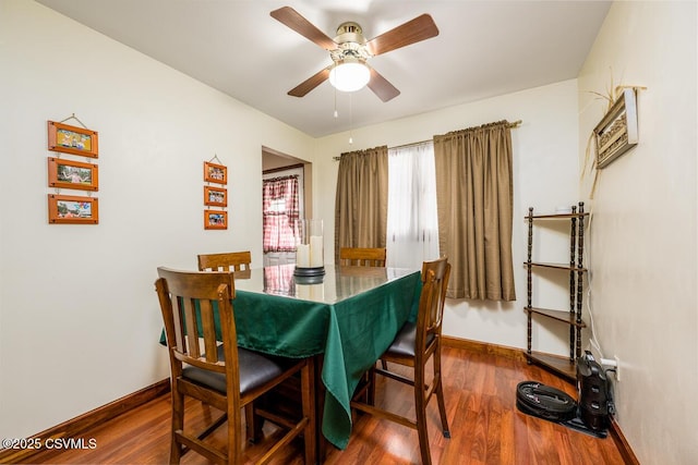 306 Clybourne Ave, Berwick, PA 18603 - dining space with wood finished floors, baseboards, and a ceiling fan