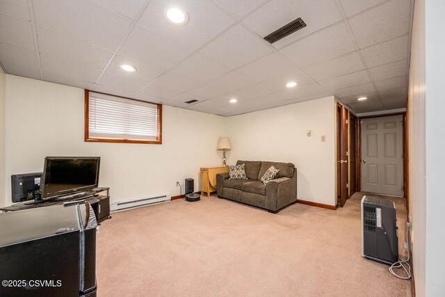 306 Clybourne Ave, Berwick, PA 18603 - living area featuring light colored carpet, a baseboard radiator, baseboards, a paneled ceiling, and recessed lighting