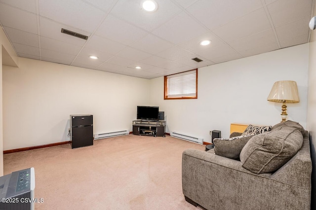 306 Clybourne Ave, Berwick, PA 18603 - carpeted living room with a baseboard heating unit, a drop ceiling, recessed lighting, and baseboards