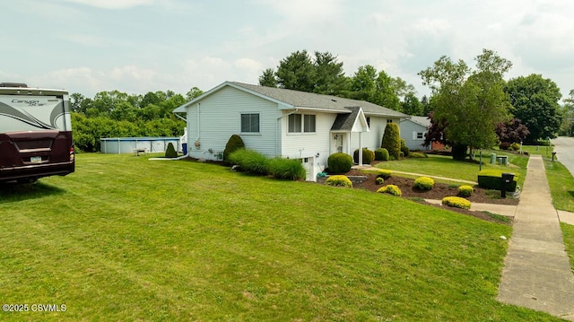 306 Clybourne Ave, Berwick, PA 18603 - back of property with a yard and an outdoor pool