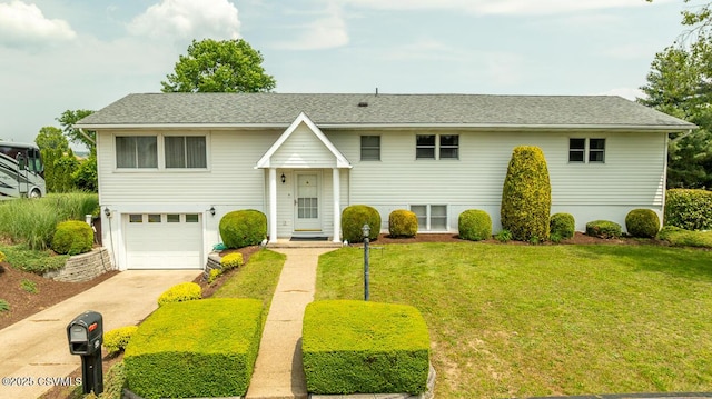 306 Clybourne Ave, Berwick, PA 18603 - raised ranch featuring an attached garage, a front yard, and concrete driveway