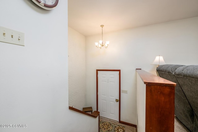 306 Clybourne Ave, Berwick, PA 18603 - stairs with a chandelier and carpet